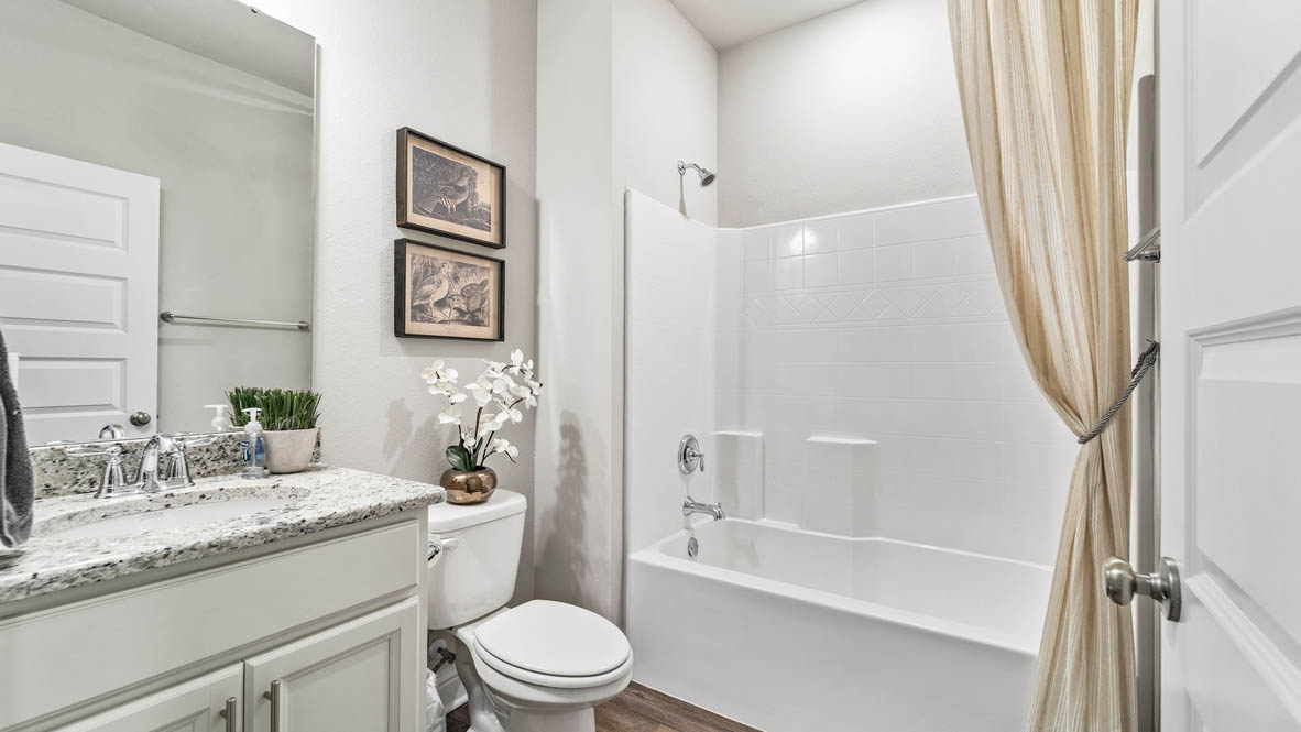 Bathroom with shower/tub combination.