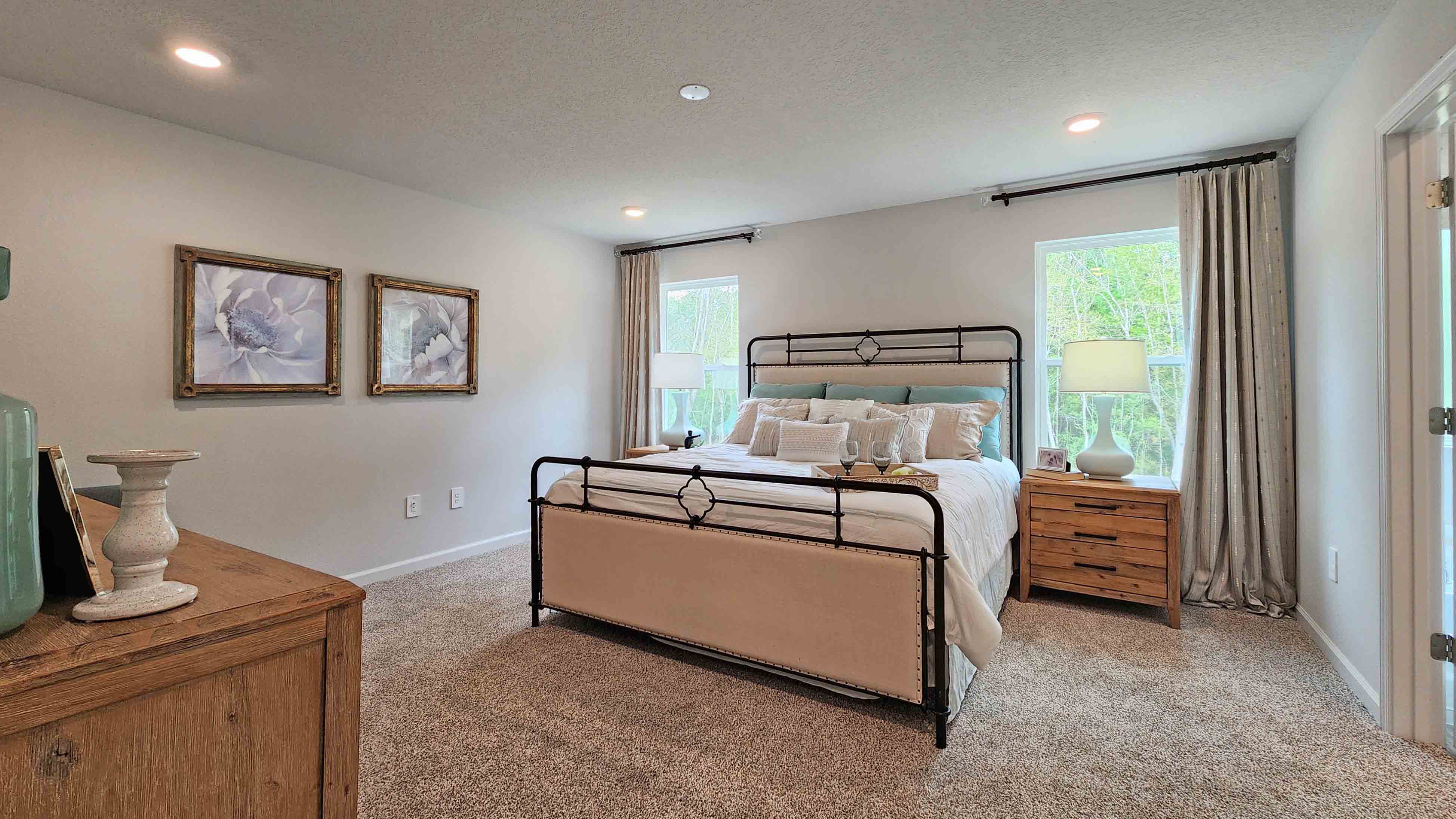 The Lakeside primary bedroom at Valor Ridge.