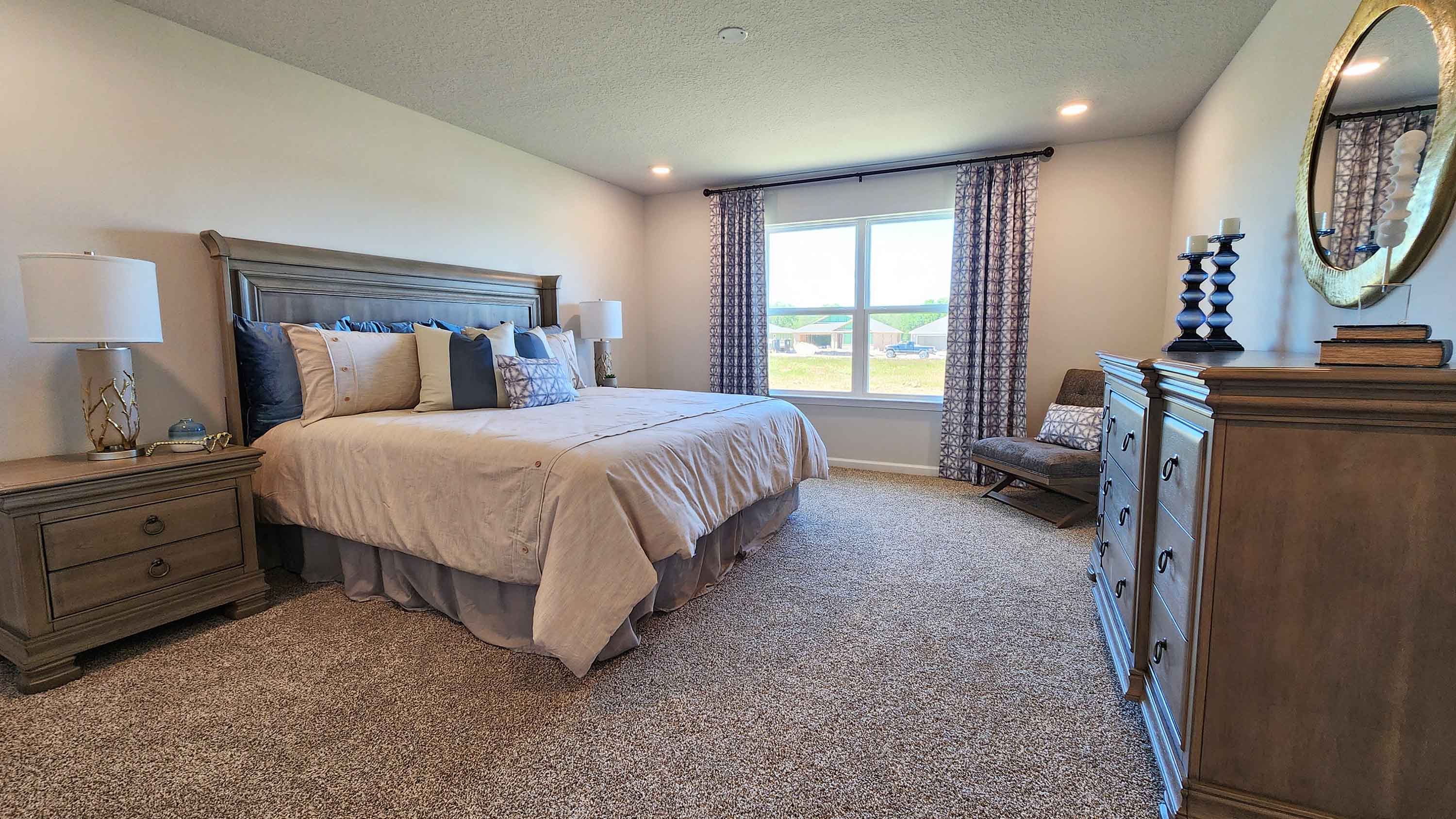 The Denton primary bedroom at Valor Ridge.