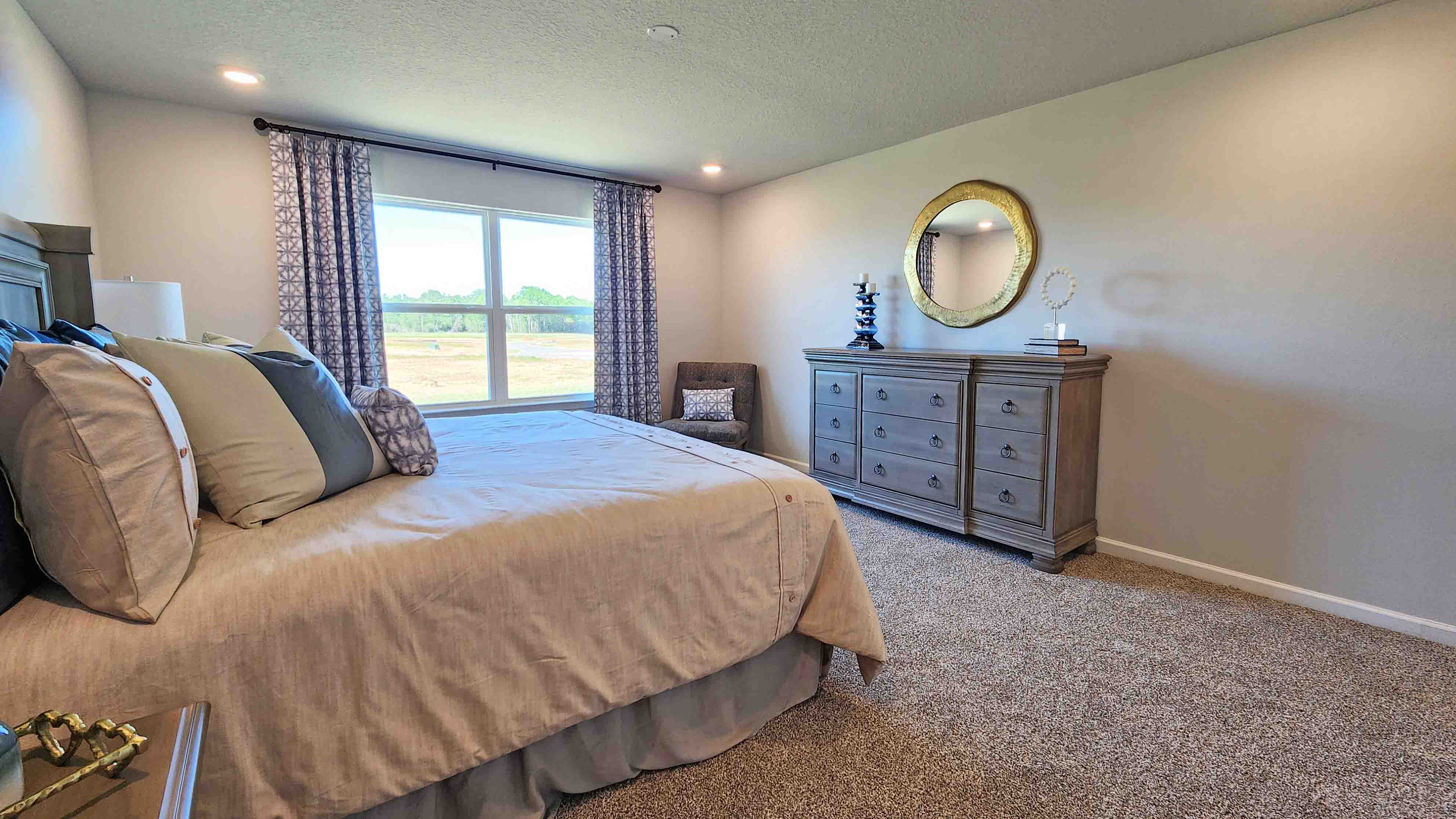 The Denton primary bedroom at Valor Ridge.
