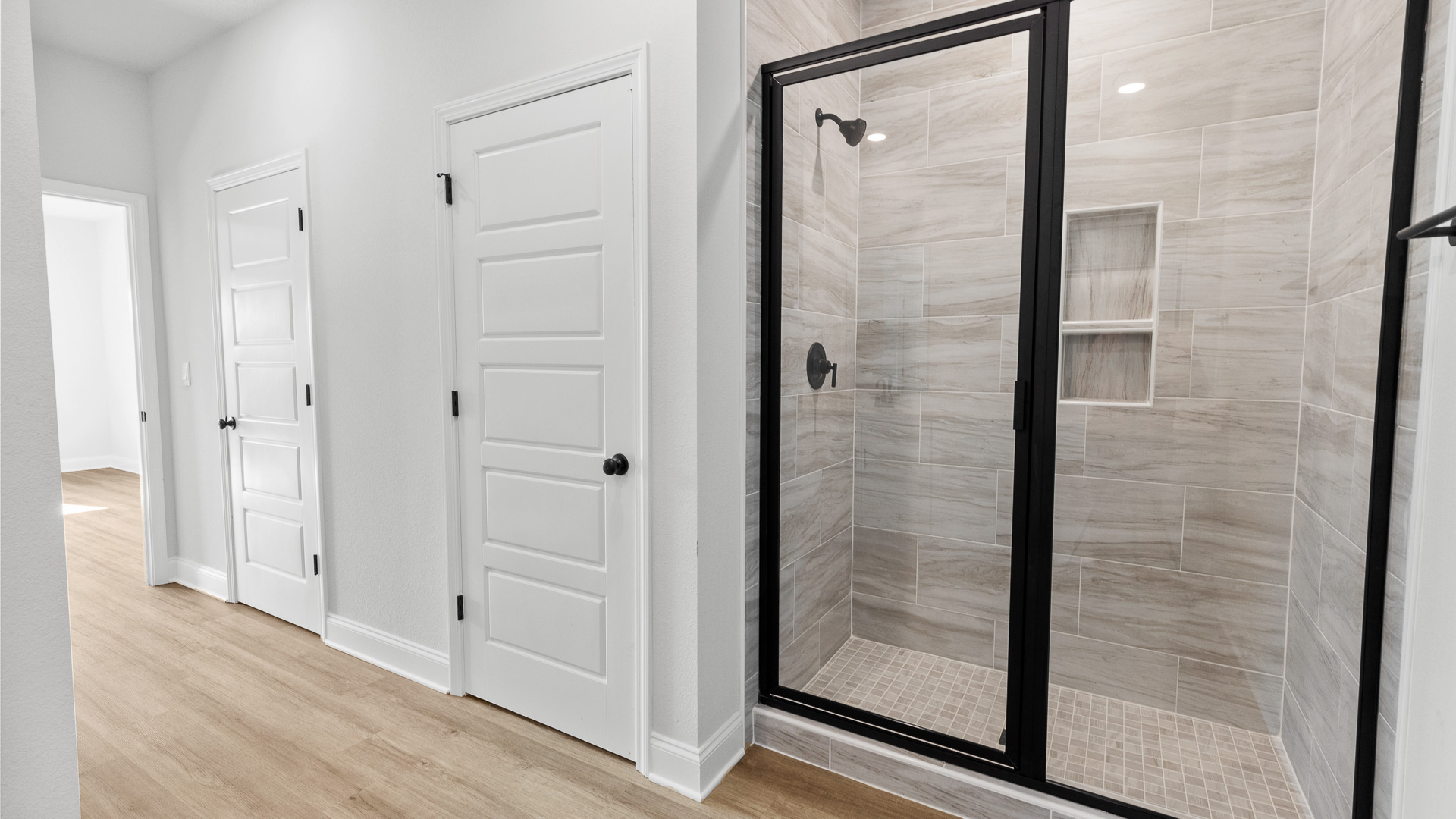 Spa-like primary walk-in shower in the Delray floorplan in Alabama.