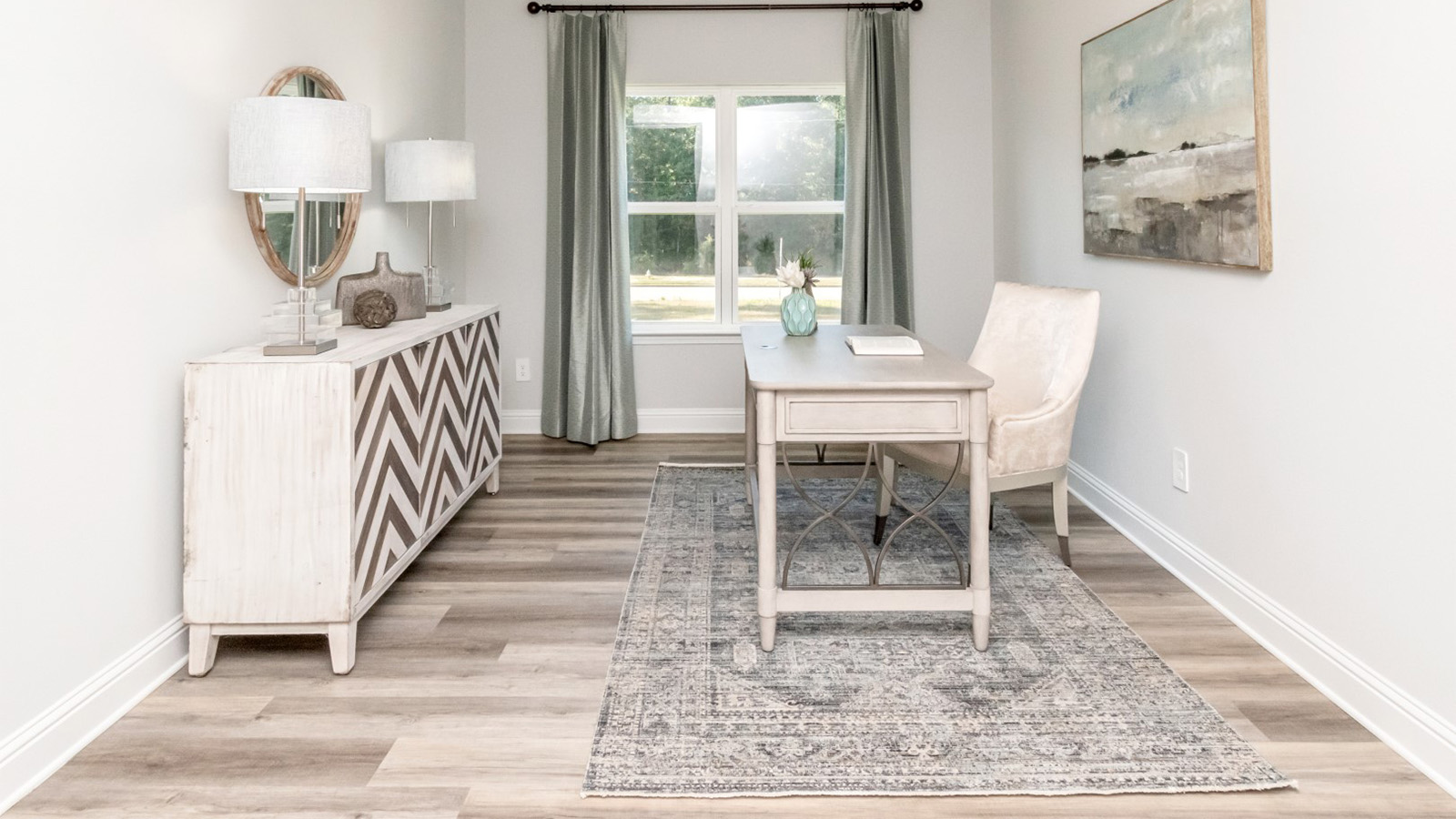 Study area with neutral color palette and elegant accents by D.R. Horton.