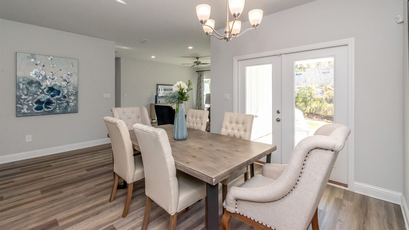 Open concept dining area off of the kitchen with access to back patio in Hawkins Manor.