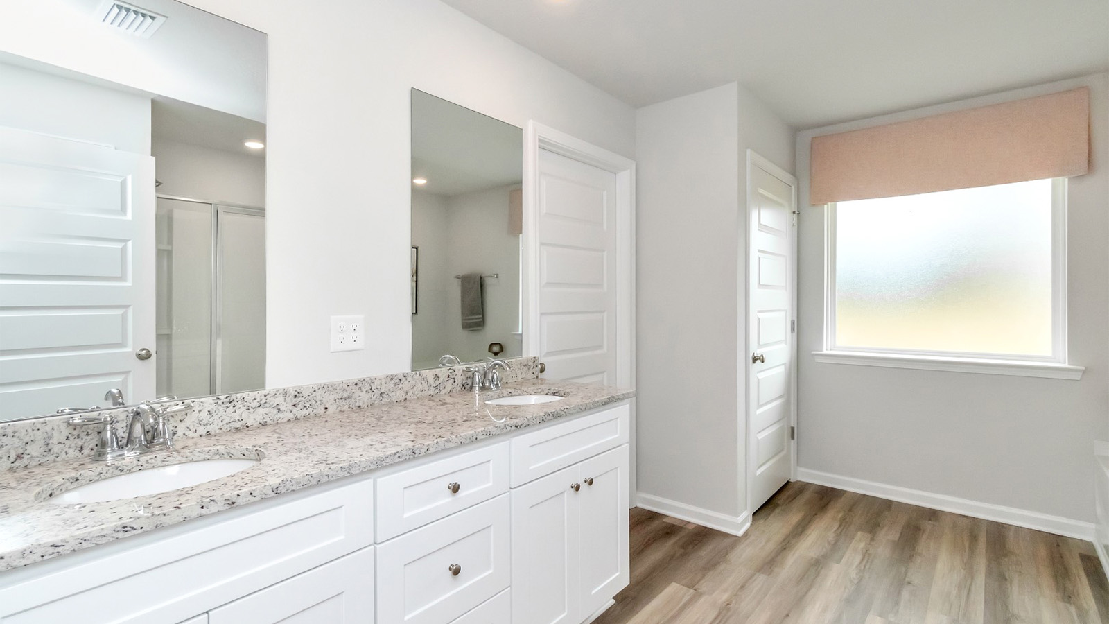 Spacious primary bathroom suite