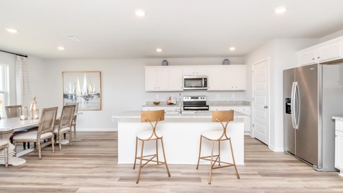 Open layout of kitchen and dining area