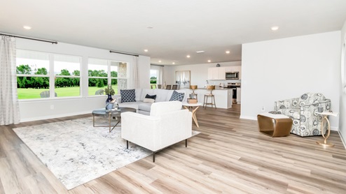 View of spacious living area and kitchen