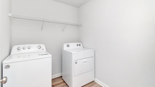 spacious laundry room inside the Cairn
