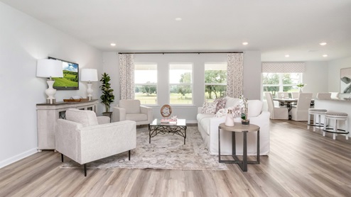 spacious living area with bright windows
