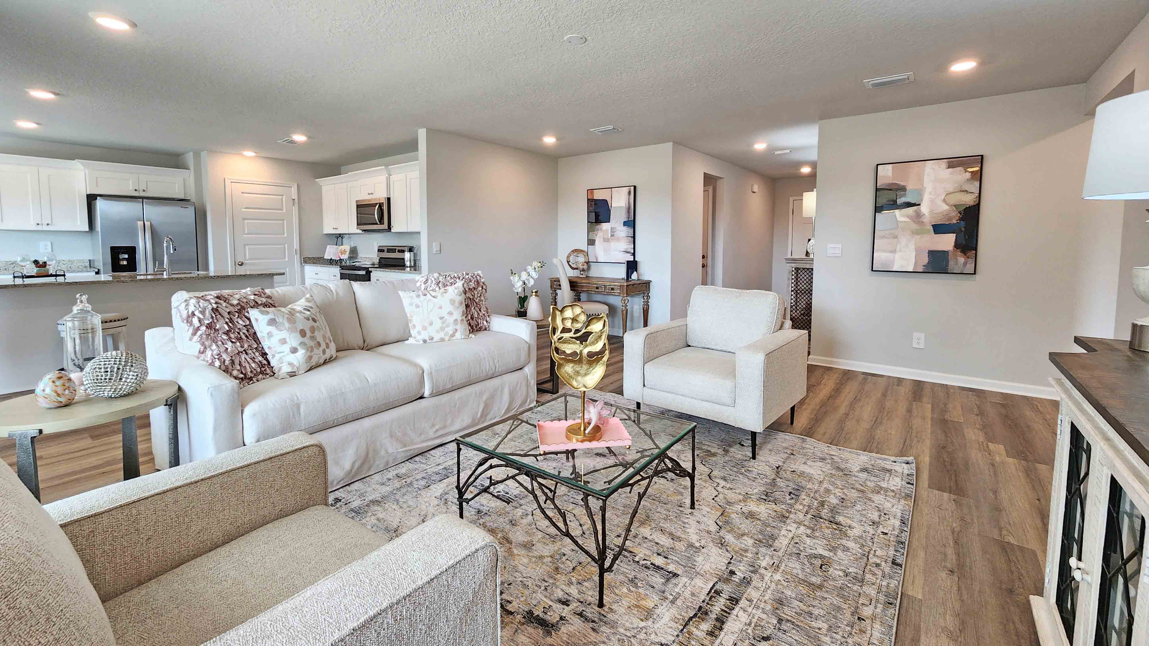 Open and airy family room with designer details in a new home.