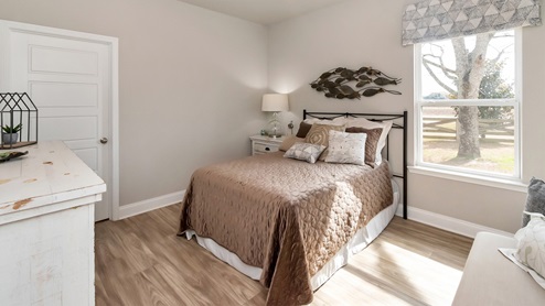 Neutral tones decorated inside an additional bedroom.