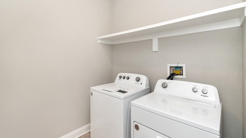 Laundry room inside the Kingston floorplan.