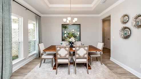 Dining area inside the Kingston model at Dees Plantation.
