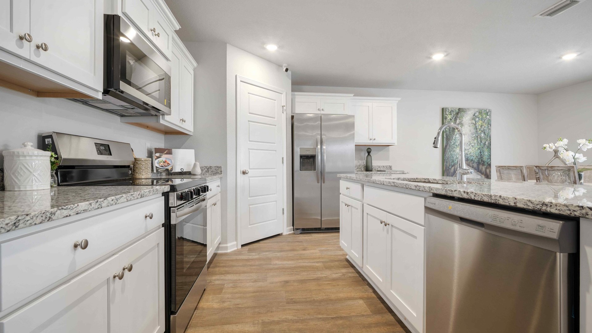 Large kitchen with stainless steel appliances