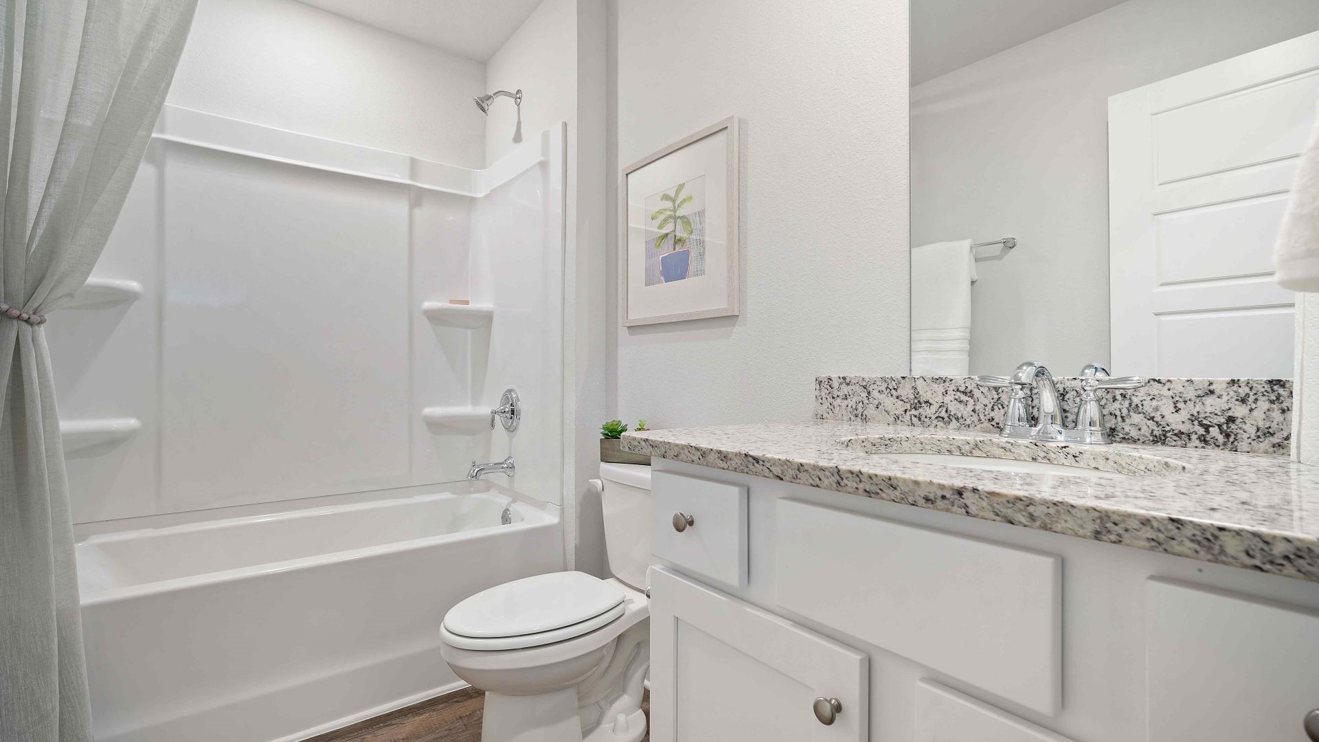 Guest bathroom with tub/shower combo