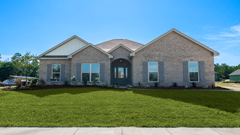 New home exterior with side-entry garage.