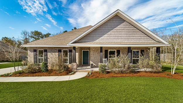 Single-story brick home with large front porch and garage.