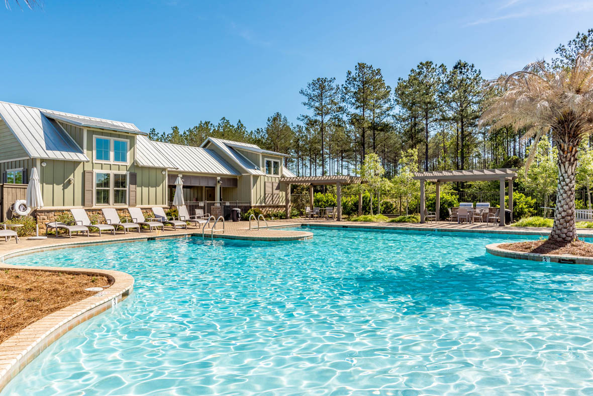 Zero-entry, resort-style pool with water fountains.