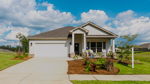 One-story new home with a covered front porch and two-car garage.