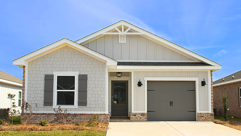New home exterior with garage.