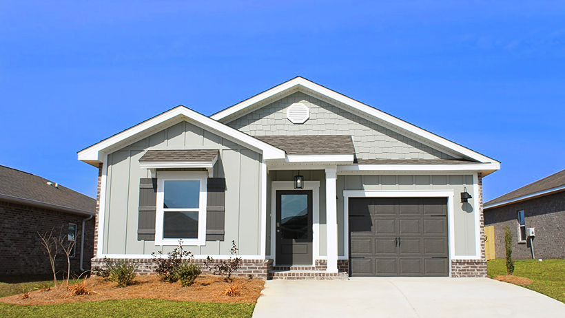 Single-story home with a painted one-car garage.