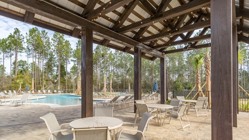 Large, covered patio with seating in the Reserve at Daphne.