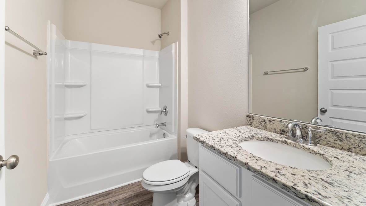 Guest bathroom with single vanity sink and tub and shower combo