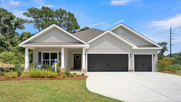 Single-story home with a covered front porch and three-car garage.