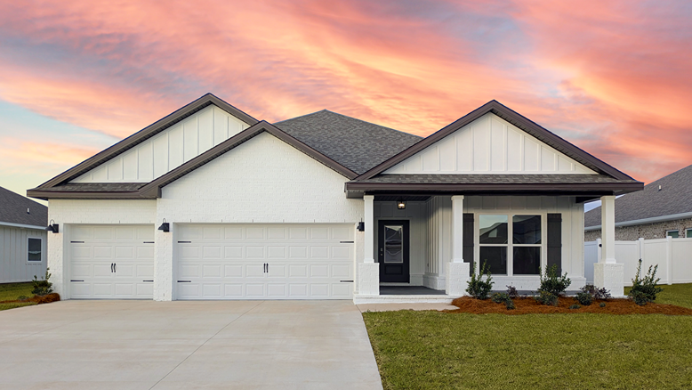 One-story new home with painted brick exterior, a covered front porch, and three-car garage.