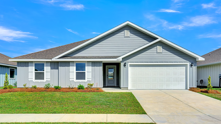 Single-story home with gray board and batten and a two-car garage.