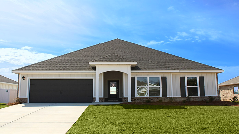 One story home with white board and batten exterior and a two-car garage.