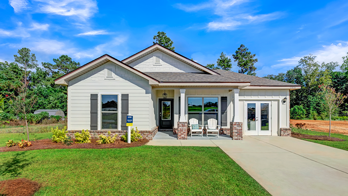 Single-story home with board and batten exterior, a brick water table, craftsman lighting, and a single car garage.