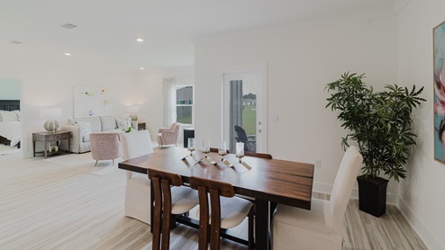 Dining nook connected to kitchen