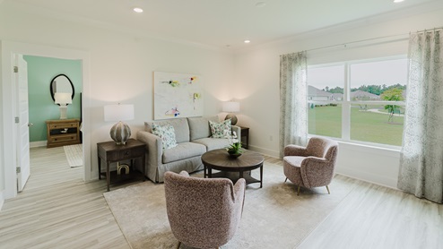 Spacious living room illuminated by natural light