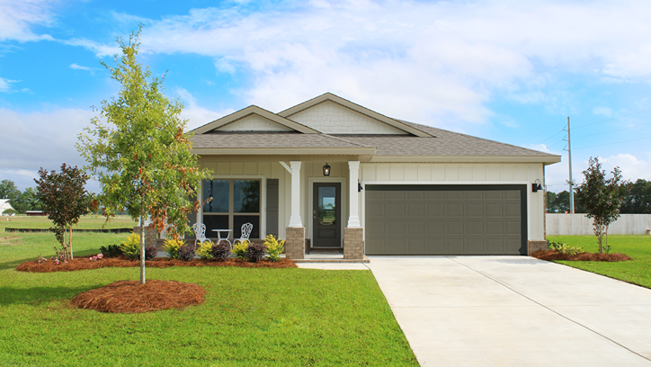 Single-story home with board and batten exterior, brick accents, and a two-car garage.