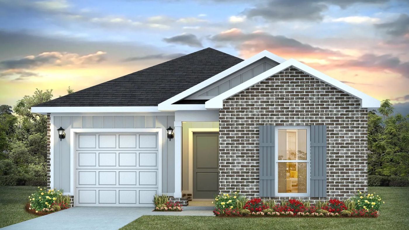 Exterior of home with brick and garage.