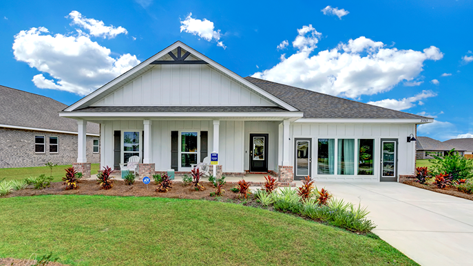 Single-story home with board and batten exterior, brick accents, and a two-car garage.