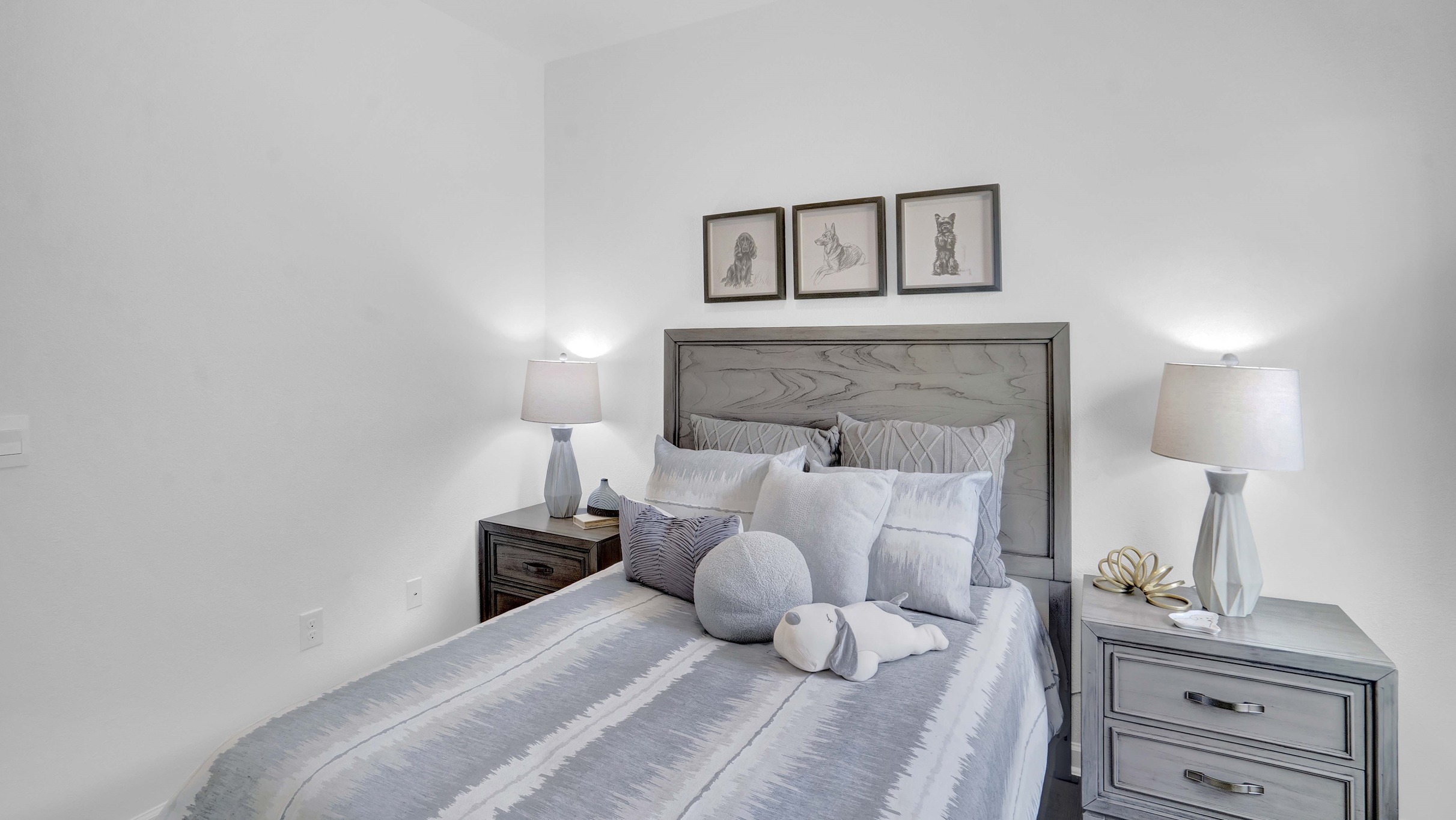 Bedroom set with striped comforter.