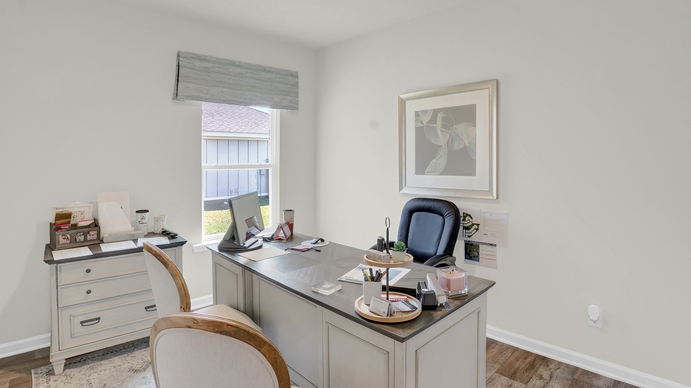 Third bedroom showing the flexibility of the area with office set.