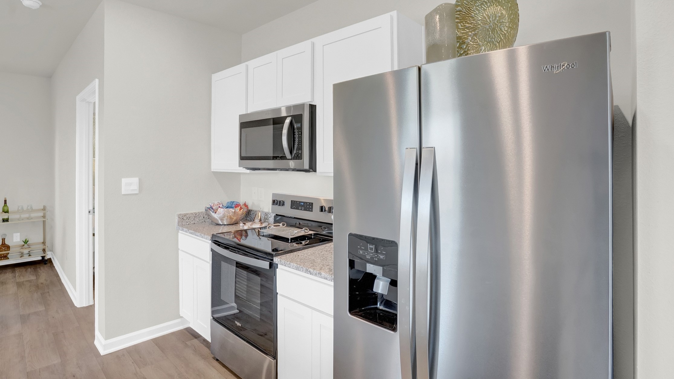 Kitchen area with stainless appliances.