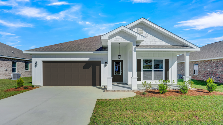 Single-story home with a covered front porch and two-car garage.