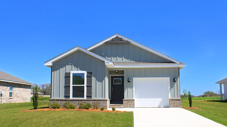 New home exterior with garage.