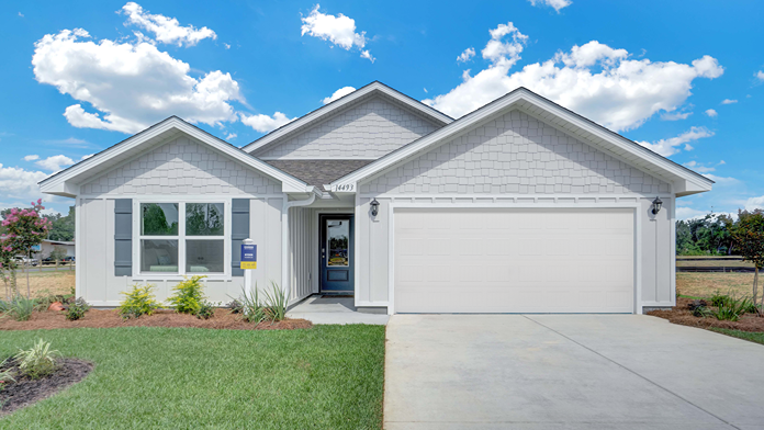 One-story home with board and batten exterior, shake gable accent, and a two-car garage.