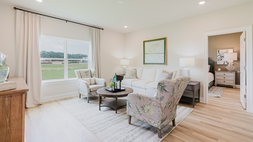 Open-concept interior of living room.