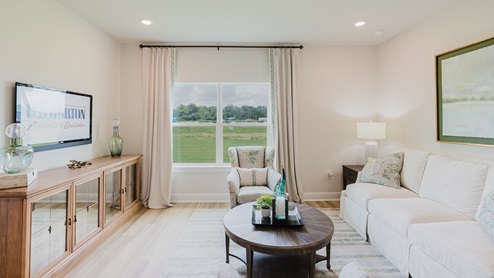 Open-concept interior of living room.