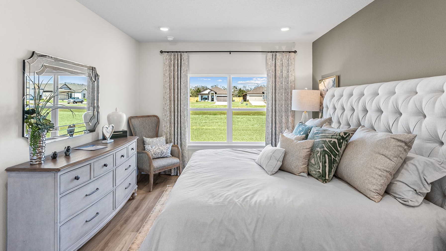 Open-concept interior of primary bedroom.