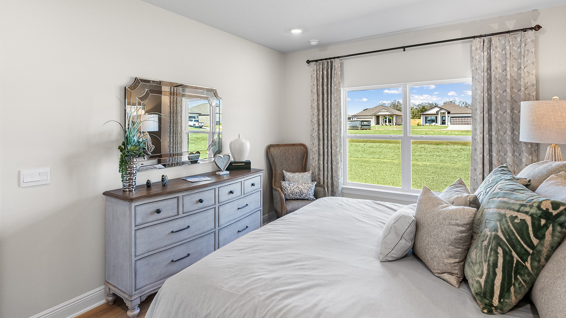 Open-concept interior of primary bedroom.
