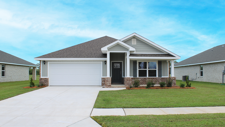 Single-story home with board and batten and brick exterior with a 2-car garage.