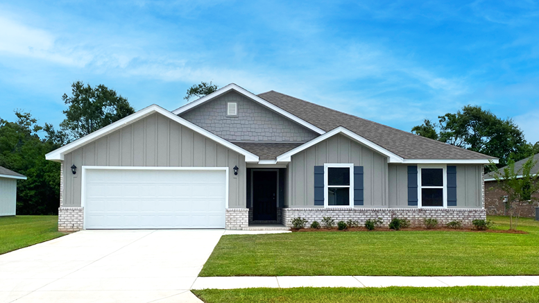 Single-story home with board and batten and brick exterior with a two-car garage.