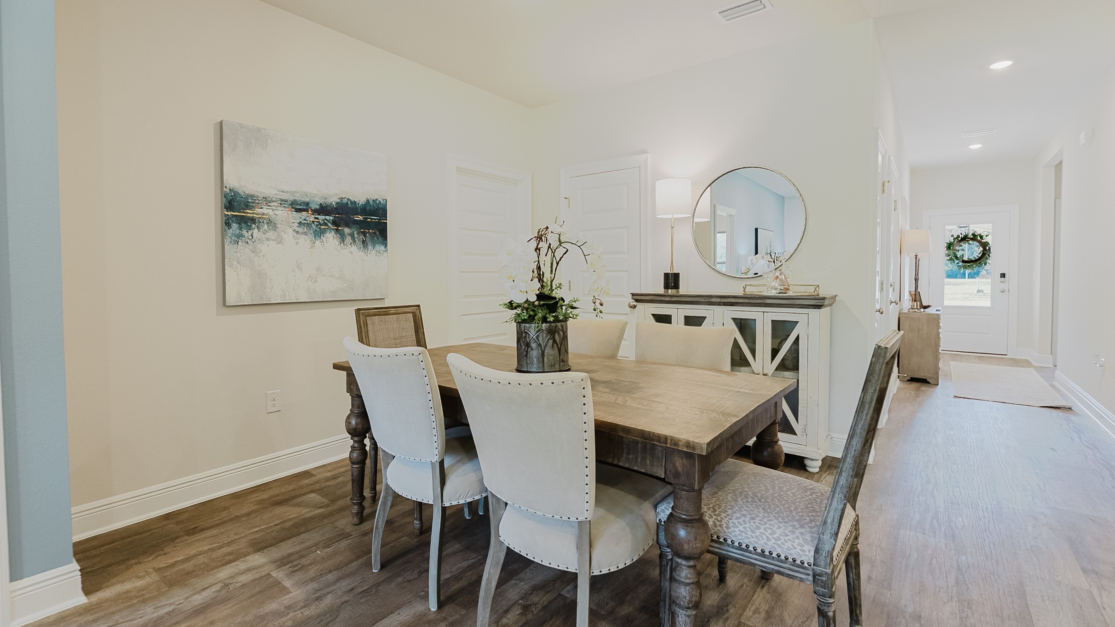 Open concept dining room with 9-foot ceilings connected off the kitchen.