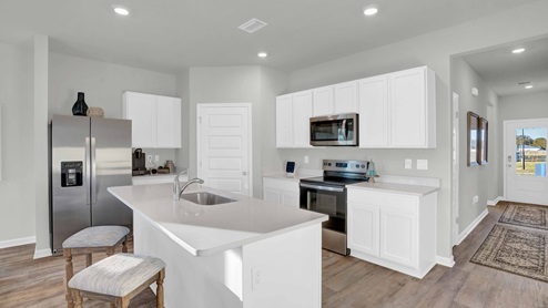 New home interior of kitchen for reference.